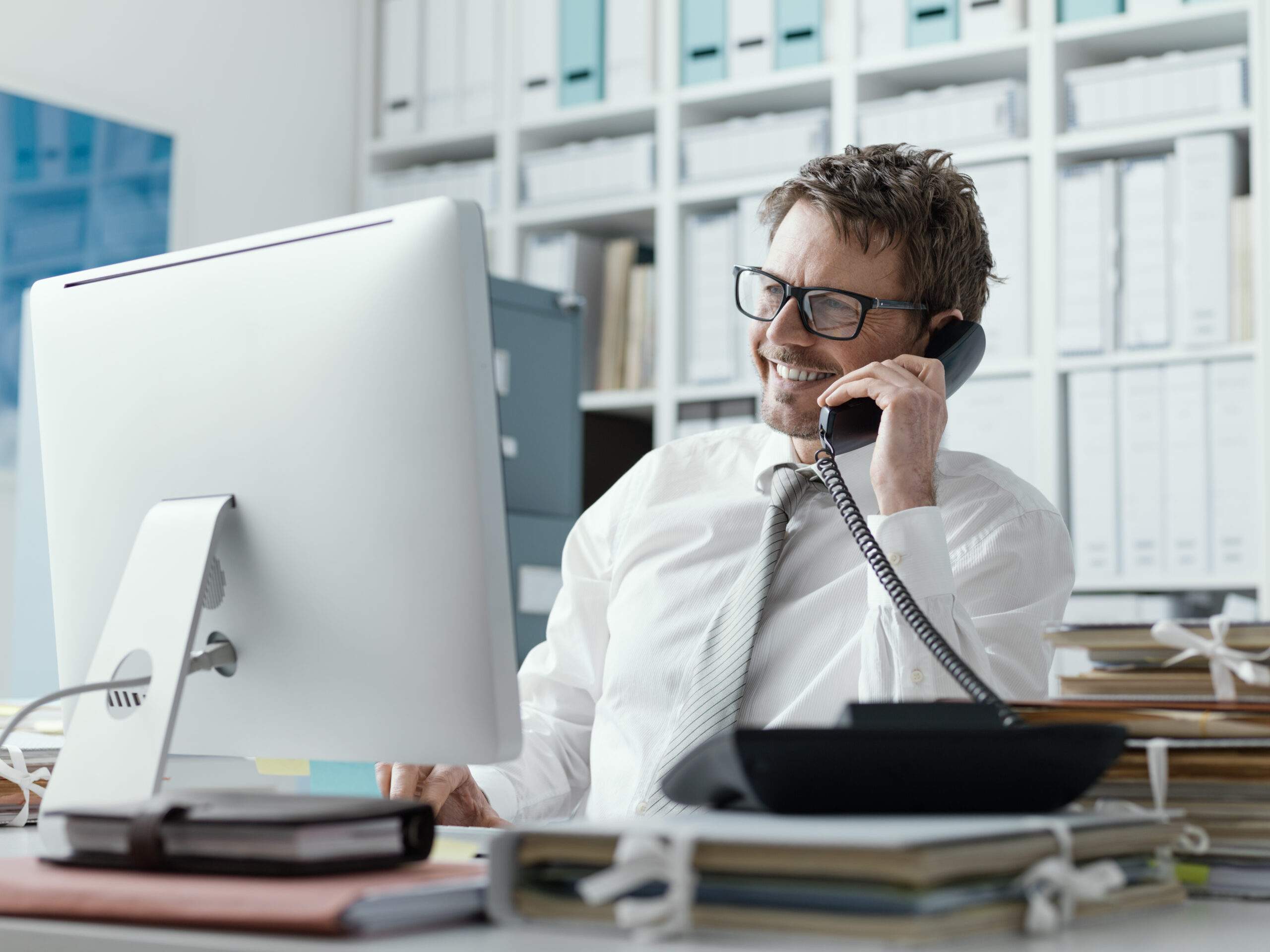 Confident happy business executive on the phone Hyperbaric Oxygen Therapy Chambers Doctor
